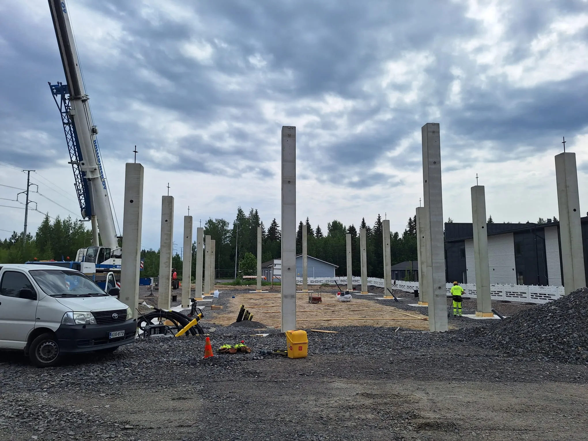 Rakennusmittausta työmaalla